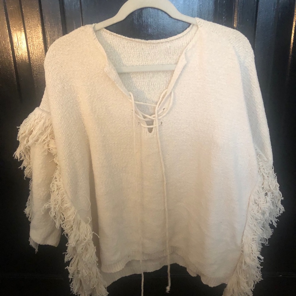Fringe tie front knit sweater